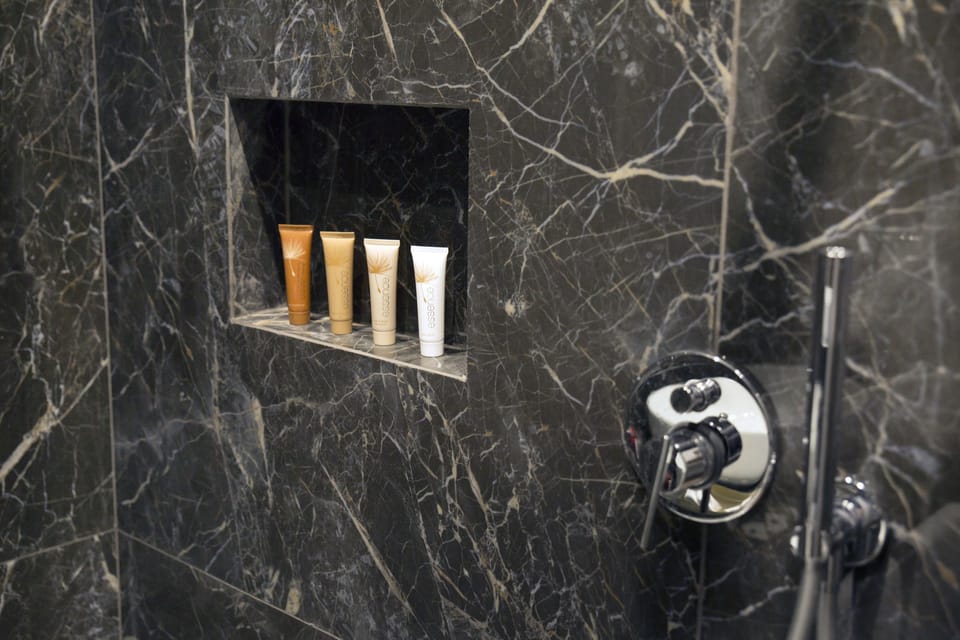 Deluxe Triple Room, Balcony | Bathroom | Shower, hair dryer, towels