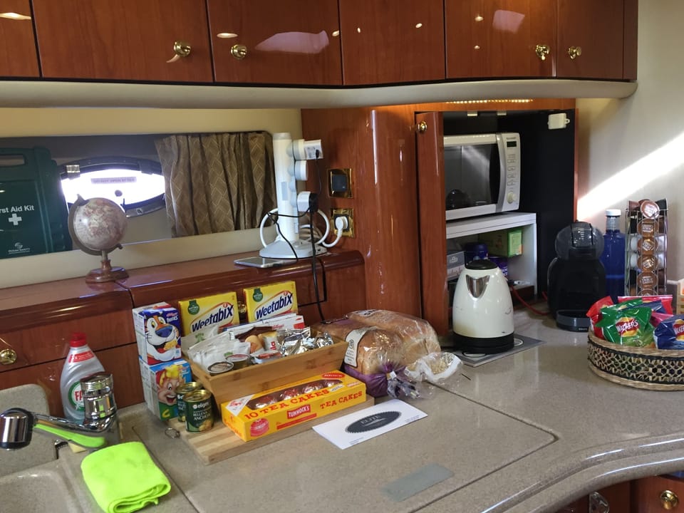 Two-Bedroom Yacht | Private kitchen | Full-size fridge, microwave, coffee/tea maker, electric kettle