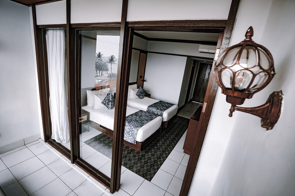 Deluxe Garden Twin with Shuttle Denpasar - Lovina - Denpasar | Minibar, in-room safe, desk, blackout drapes