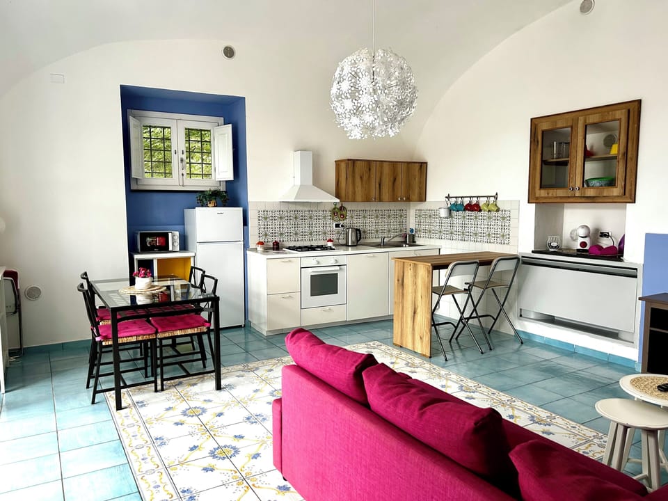 Apartment, 1 Bedroom, Jetted Tub, Ground Floor (Sirentum) | Living area | Flat-screen TV