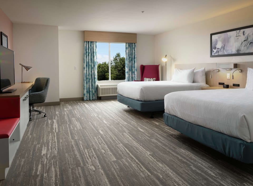 Premium bedding, down comforters, in-room safe, desk