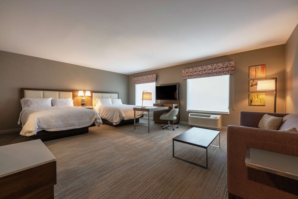 Studio Suite, 2 Queen Beds | In-room safe, desk, iron/ironing board, free cribs/infant beds
