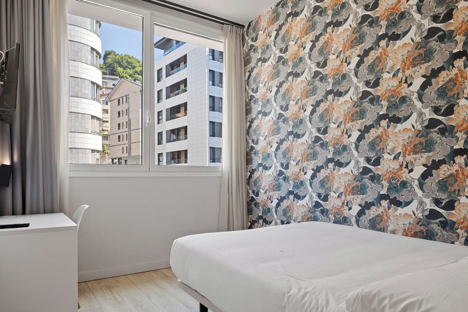 Basic Room | Down comforters, in-room safe, individually decorated