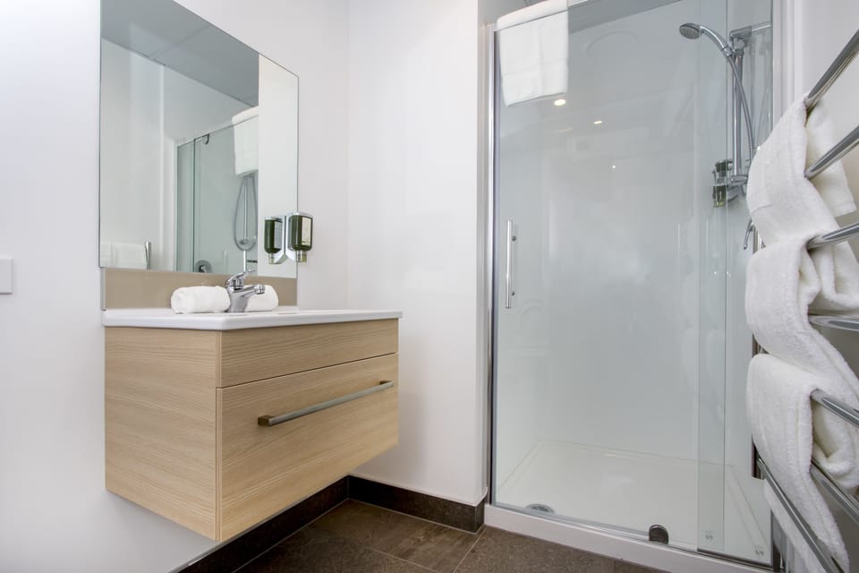 Shower, free toiletries, hair dryer, towels