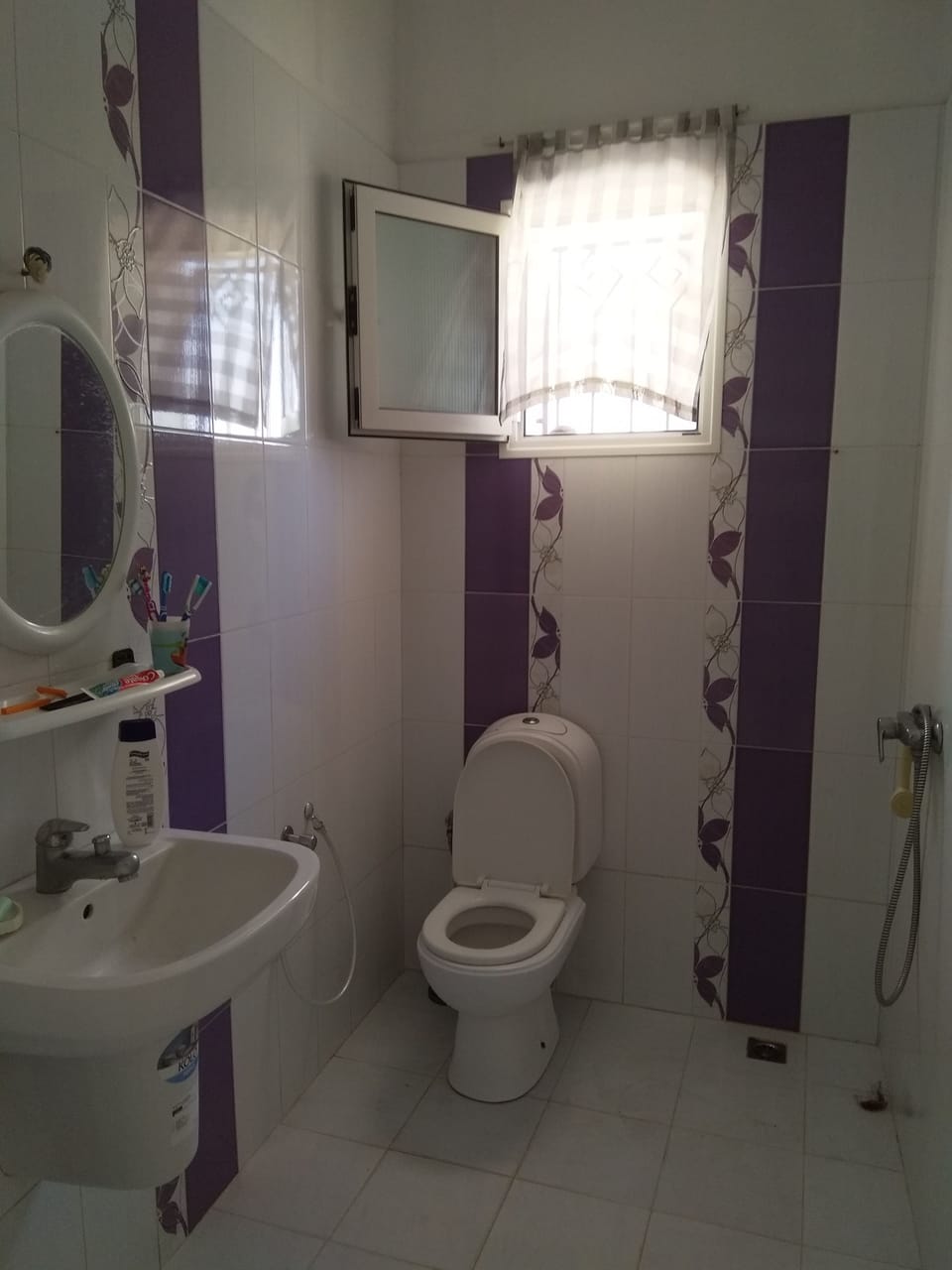 Basic House | Bathroom | Shower, rainfall showerhead, towels, soap