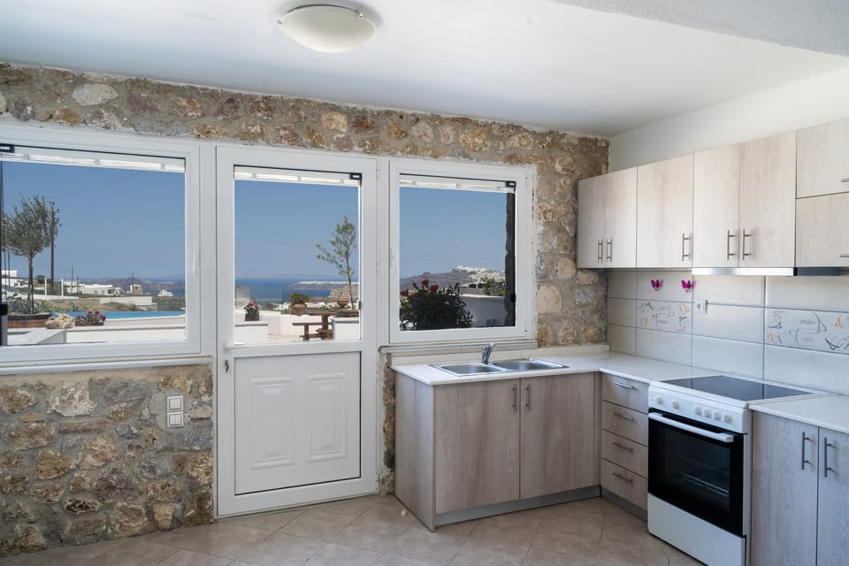 Apartment with Panoramic View | Living area | Flat-screen TV