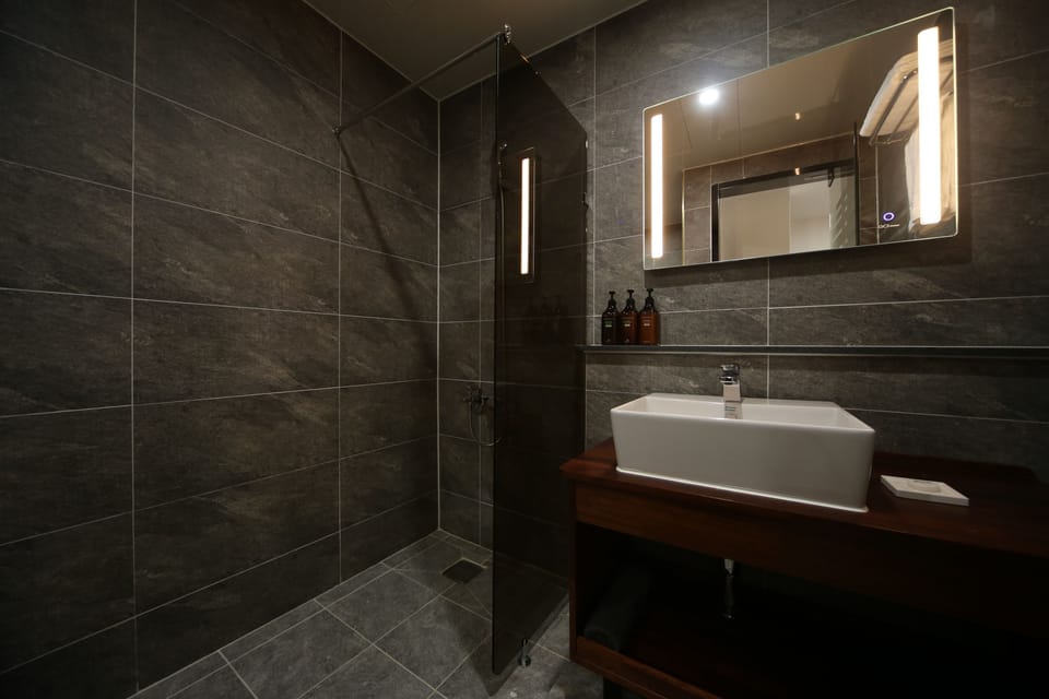 Hair dryer, bathrobes, slippers, towels