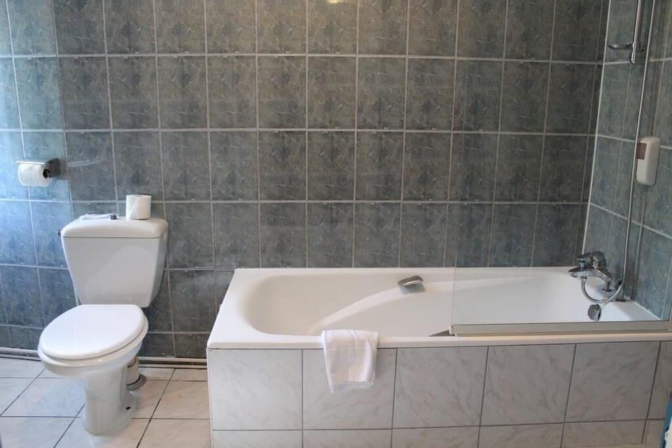Hair dryer (on request), towels, soap, shampoo