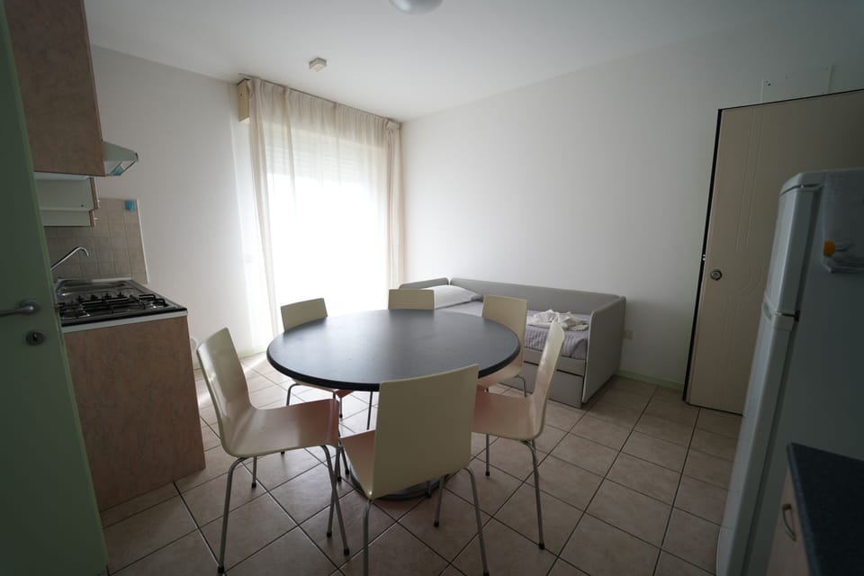 Standard Apartment, 1 Bedroom | Living area | 26-inch TV with digital channels