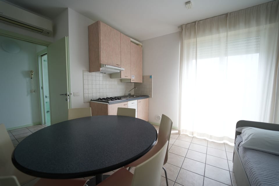 Standard Apartment, 2 Bedrooms | Private kitchen | Fridge, microwave, stovetop, cookware/dishes/utensils