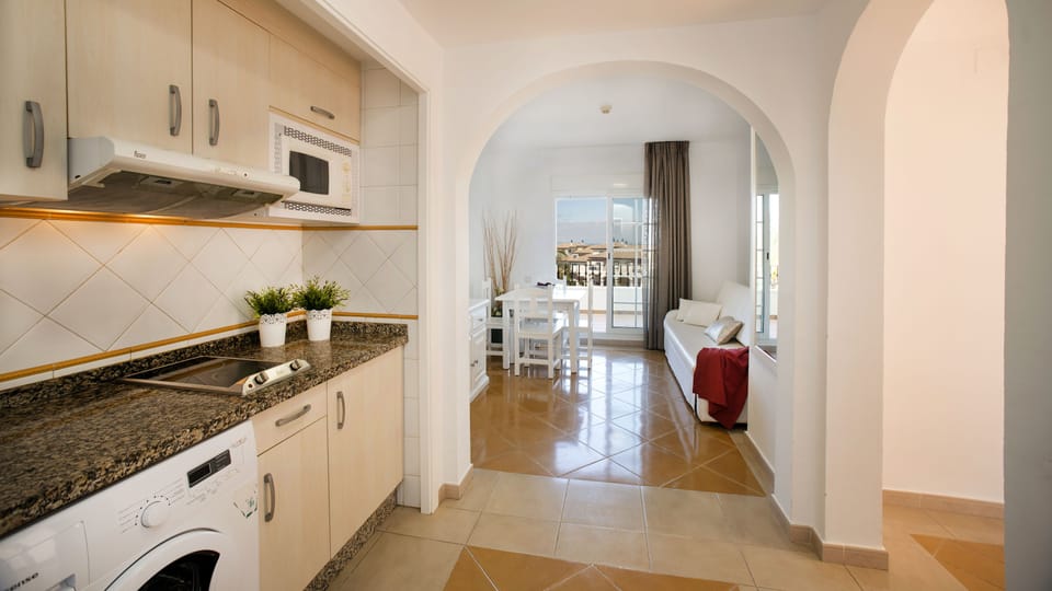 Apartment, 2 Bedrooms (4 adults + 2 children) | Private kitchen | Full-size fridge, microwave, stovetop, coffee/tea maker