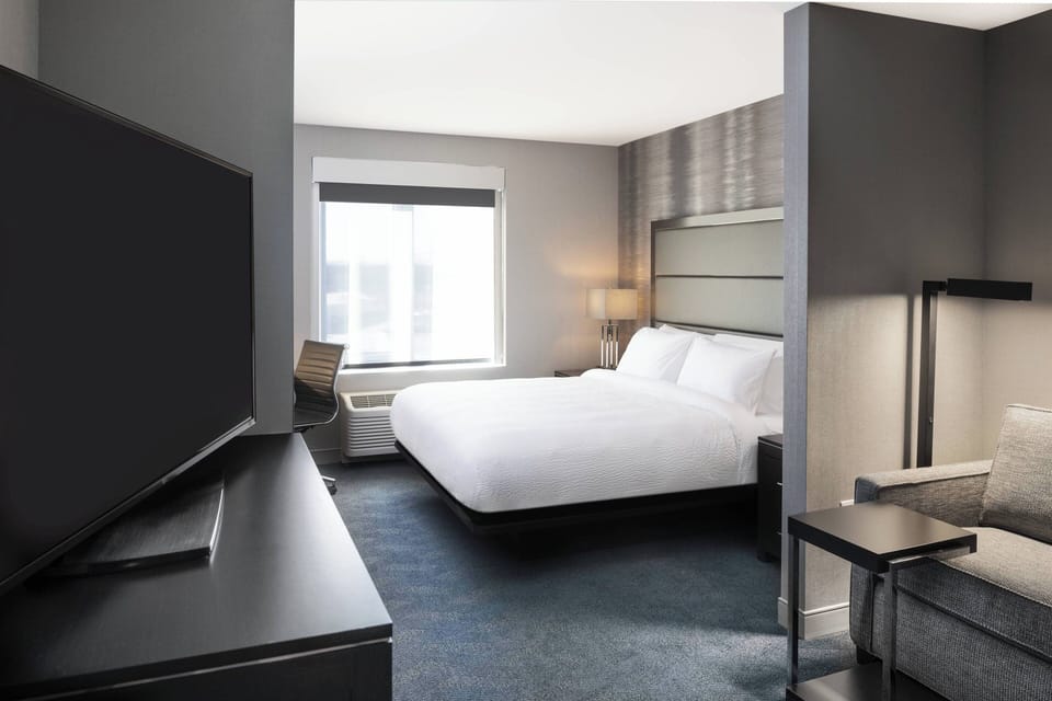 Suite, 1 King Bed with Sofa bed | Desk, laptop workspace, iron/ironing board, cribs (free)