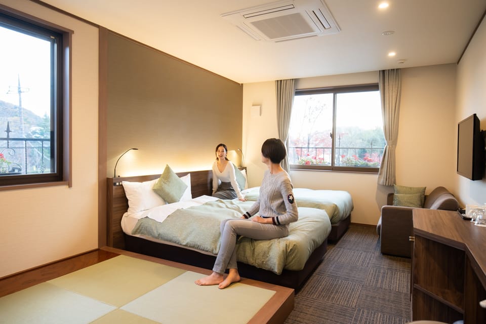 Family type room | In-room safe, desk, laptop workspace, blackout drapes