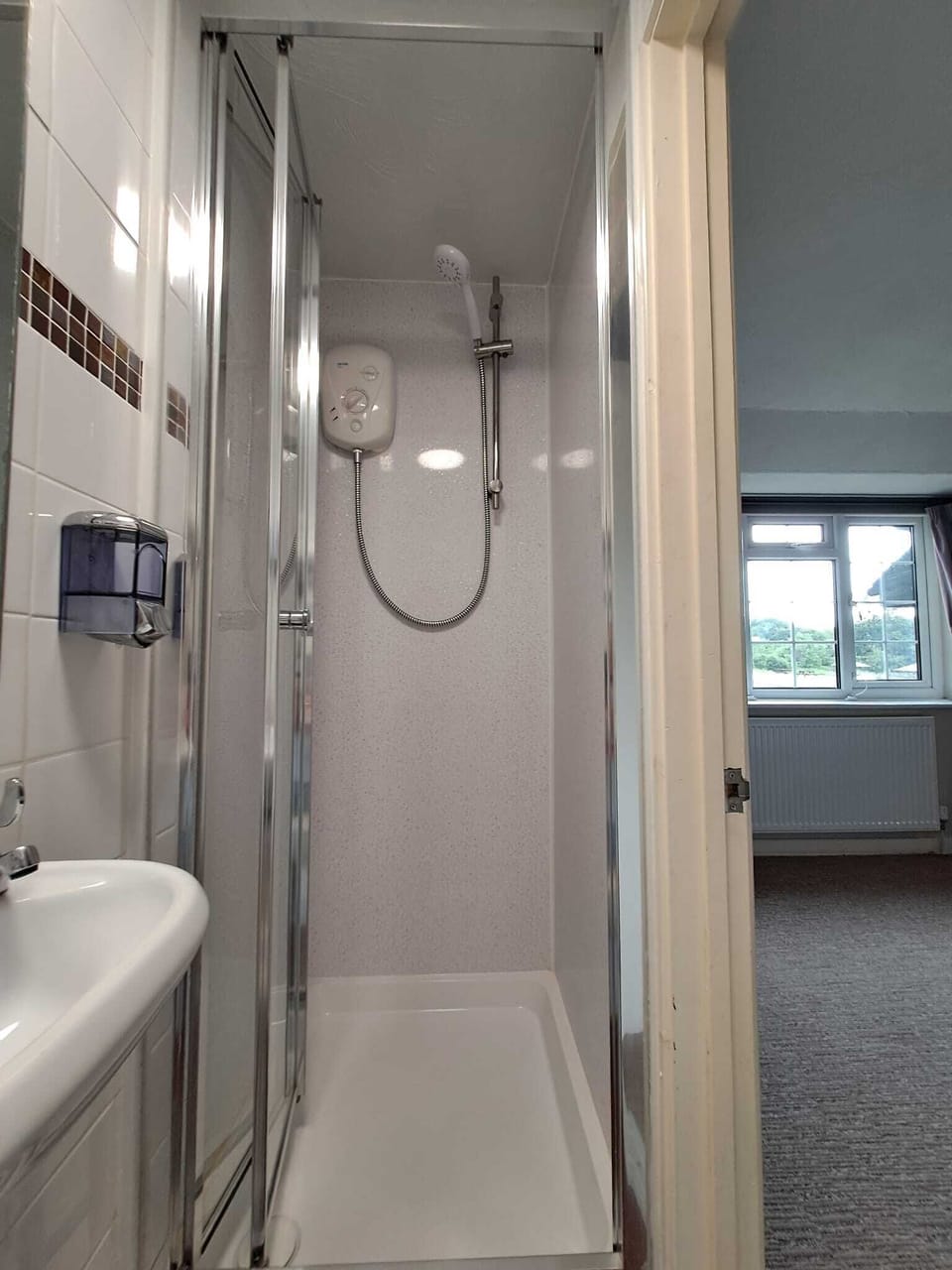 Shower, free toiletries, hair dryer, towels
