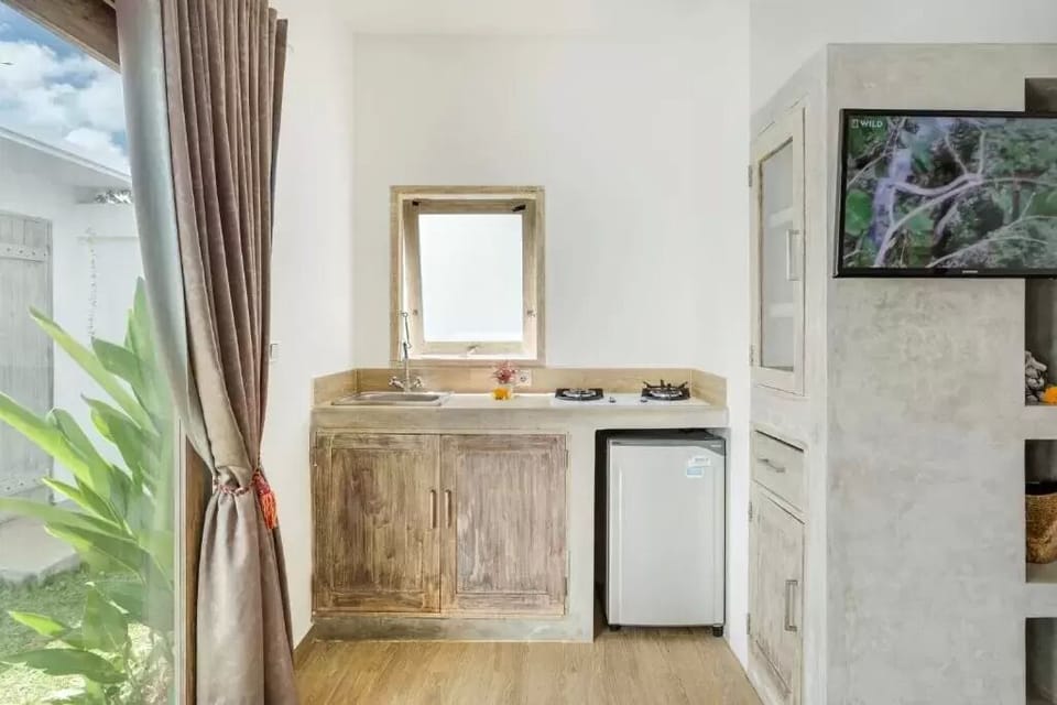 Fridge, stovetop, espresso maker, coffee/tea maker