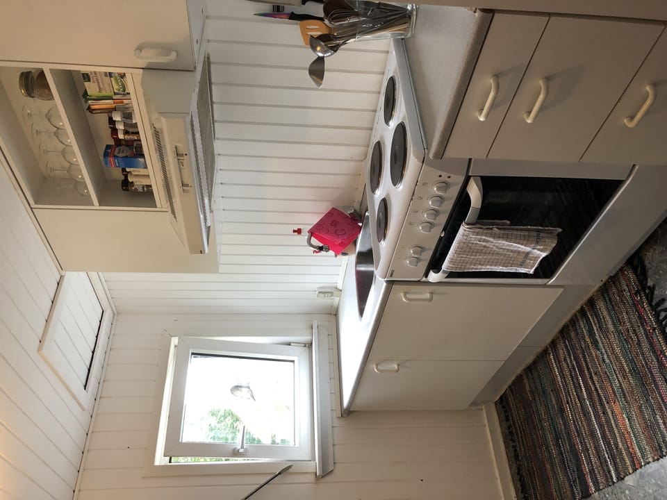 Family Apartment, Garden View | Private kitchen | Shared fridge, microwave