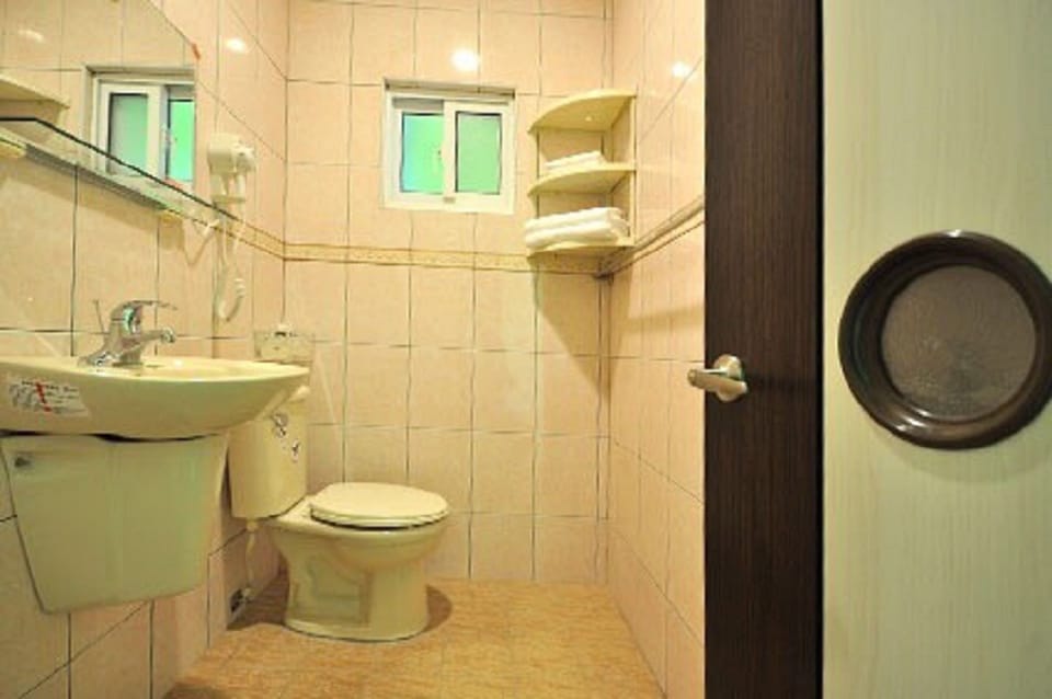 Shower, free toiletries, hair dryer, slippers