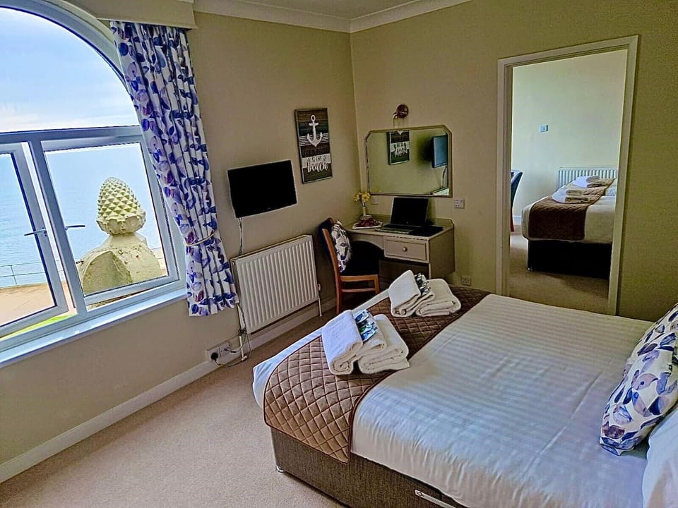 Family Room, Sea View | Individually decorated, individually furnished, blackout drapes