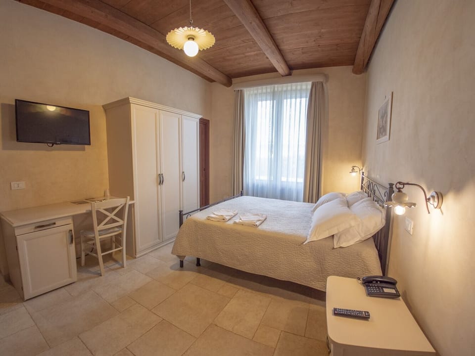 Family Room | Minibar, desk, blackout drapes, soundproofing