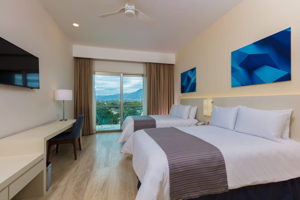 Deluxe Room, Mountain View | 1 bedroom, in-room safe, desk, blackout drapes