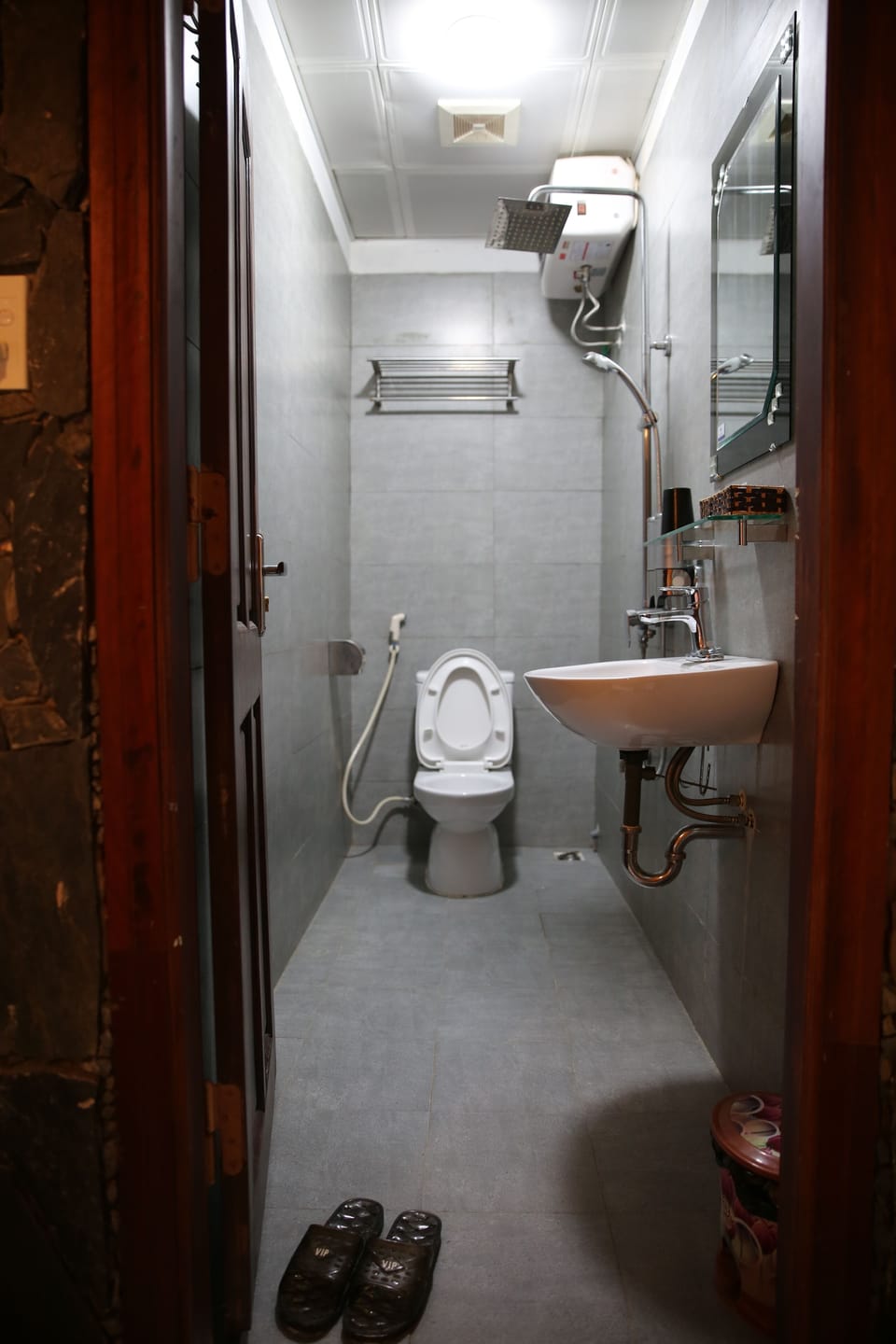 Shower, free toiletries, hair dryer, slippers
