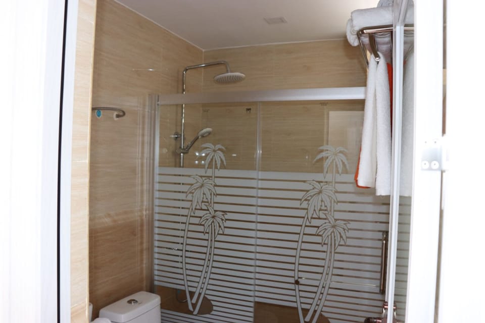 Shower, free toiletries, hair dryer, bathrobes