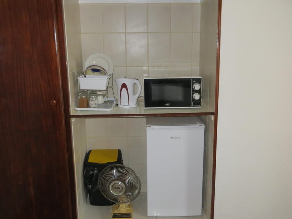 Coffee/tea maker, fridge, microwave, electric kettle