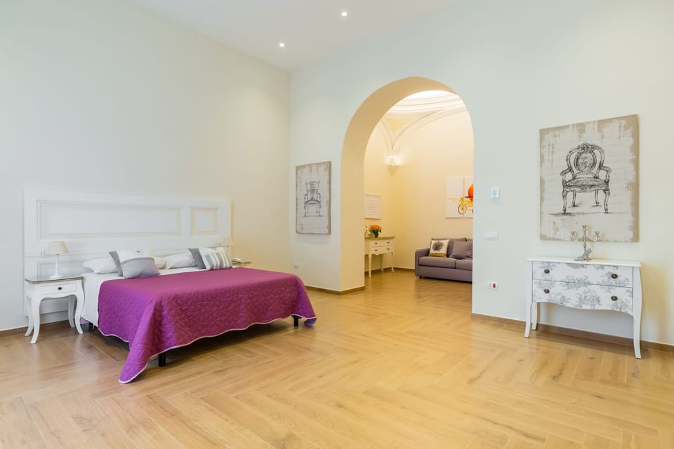 Luxury Triple Room (Suite La Gatta Cenerentola) | Individually decorated, individually furnished, desk, laptop workspace