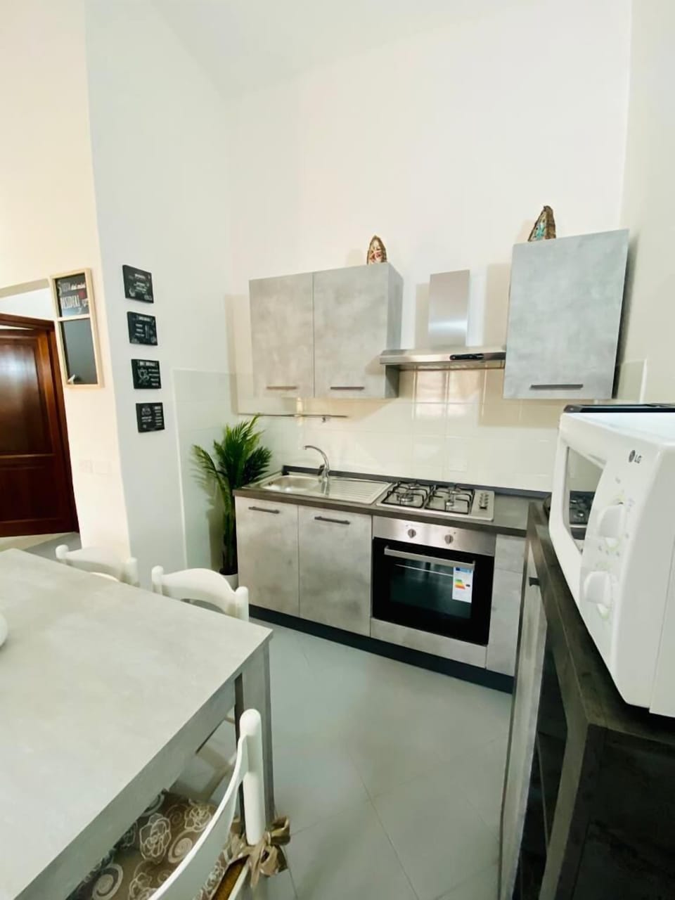 Apartment, 2 Bedrooms | Private kitchen | Full-size fridge, oven, stovetop, espresso maker