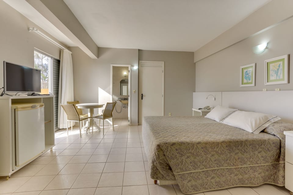 Basic Quadruple Room, Beach View, Beachfront | Minibar, blackout drapes, free WiFi, bed sheets