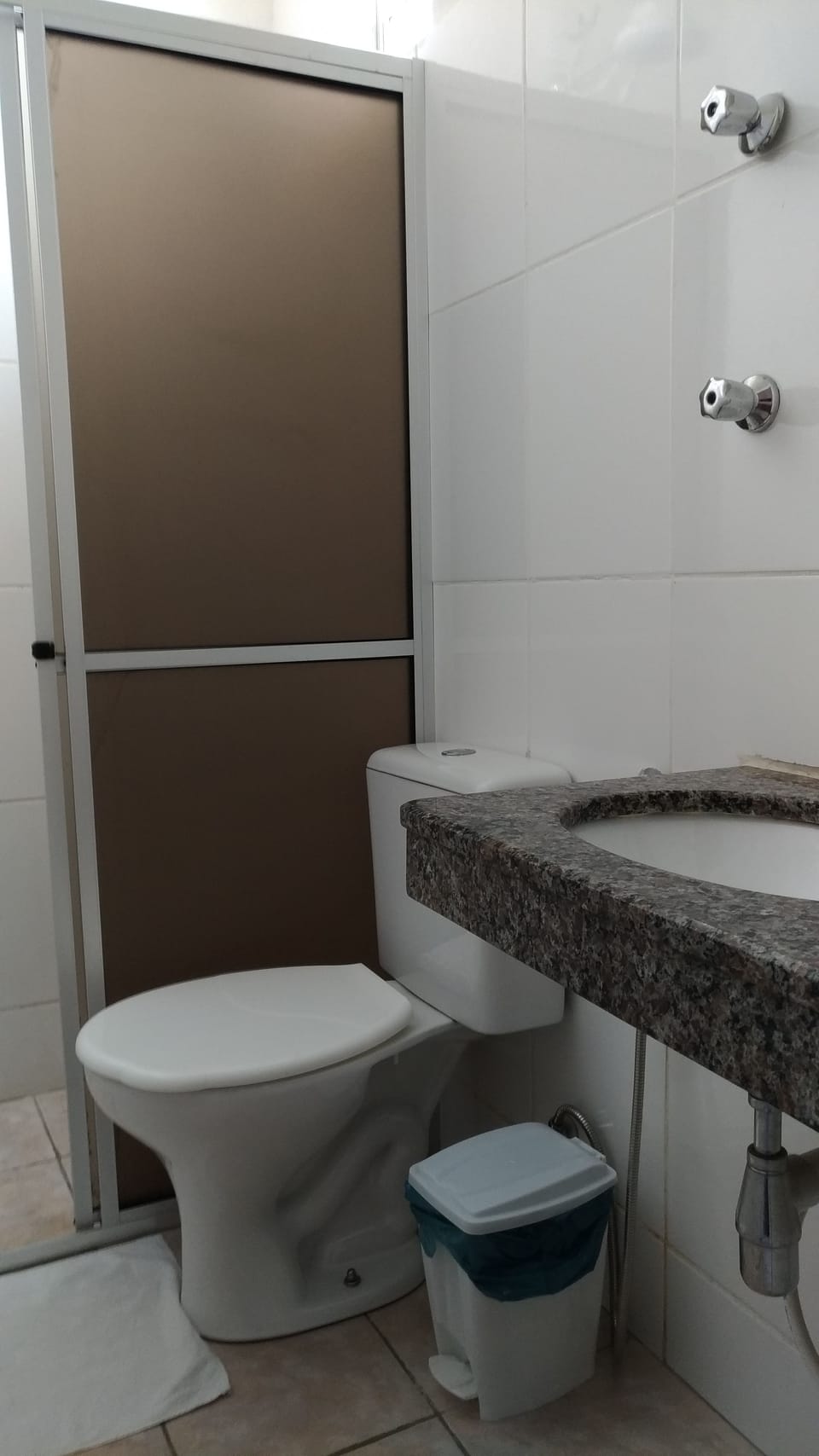 Shower, towels, soap, toilet paper