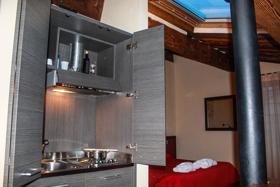 Classic Quadruple Room, Non Smoking | Private kitchenette | Fridge