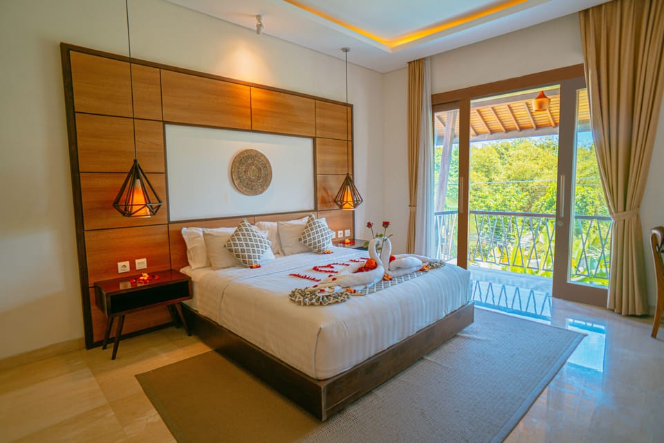 Deluxe Room, Pool View | Premium bedding, in-room safe, desk, laptop workspace