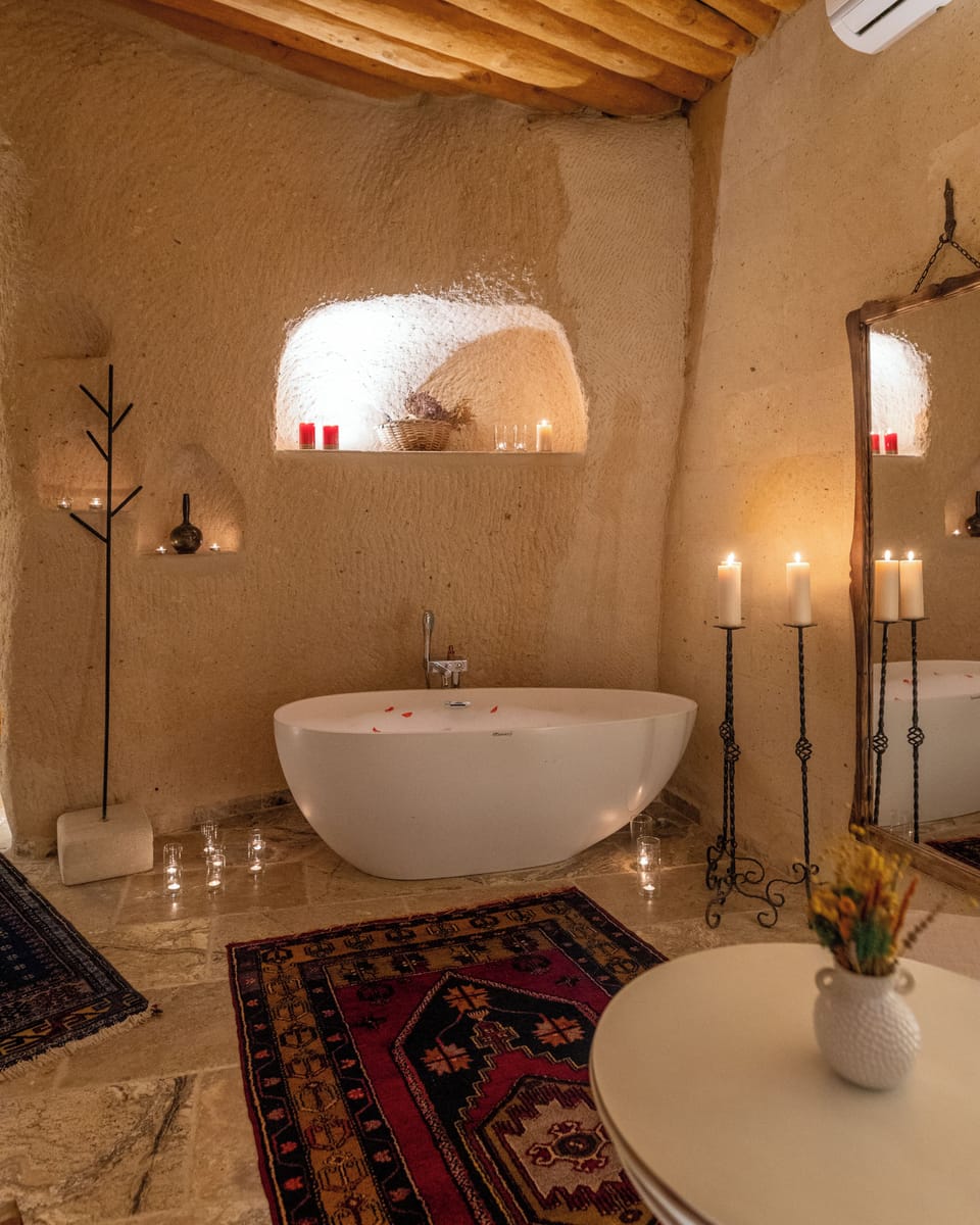 Superior Cave Room | Bathroom | Shower, rainfall showerhead, designer toiletries, hair dryer
