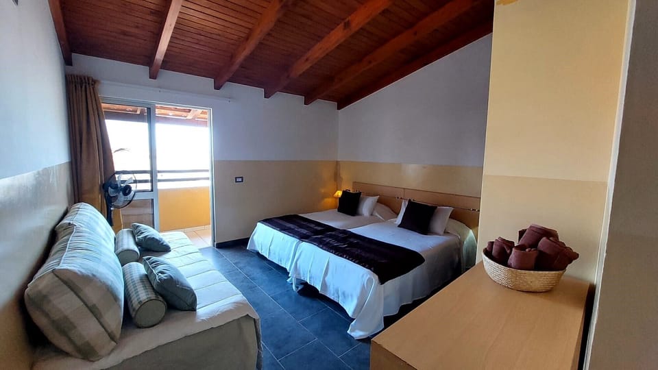 Triple Room, Balcony | In-room safe, blackout drapes, bed sheets