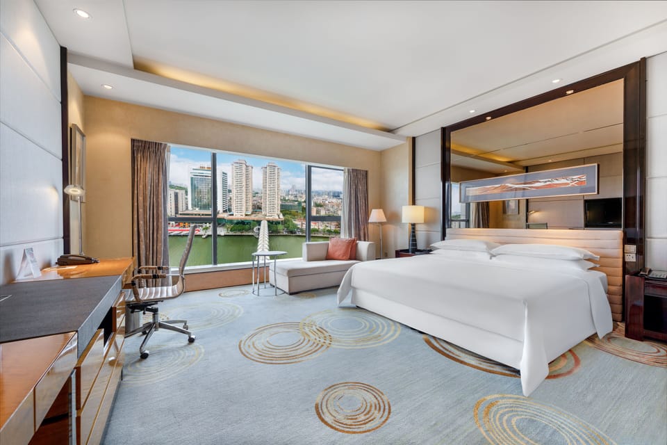 Room, 1 King Bed, River View | 1 bedroom, premium bedding, minibar (some free items), in-room safe
