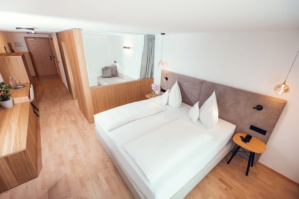 Junior Suite, Balcony, Hill View | 1 bedroom, hypo-allergenic bedding, down comforters, minibar