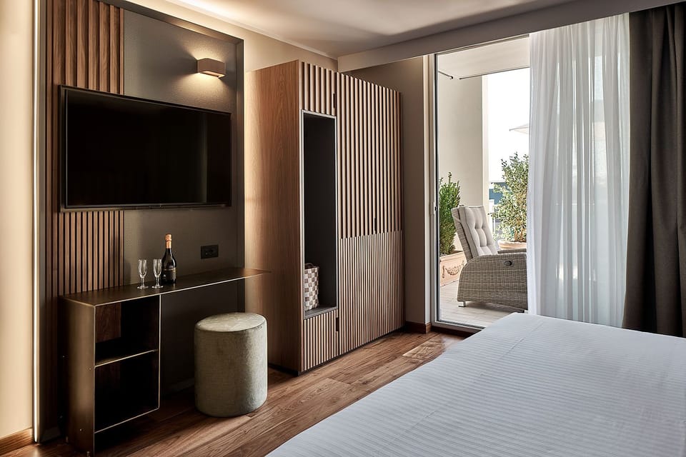 Suite, Terrace | Minibar, in-room safe, individually furnished, desk