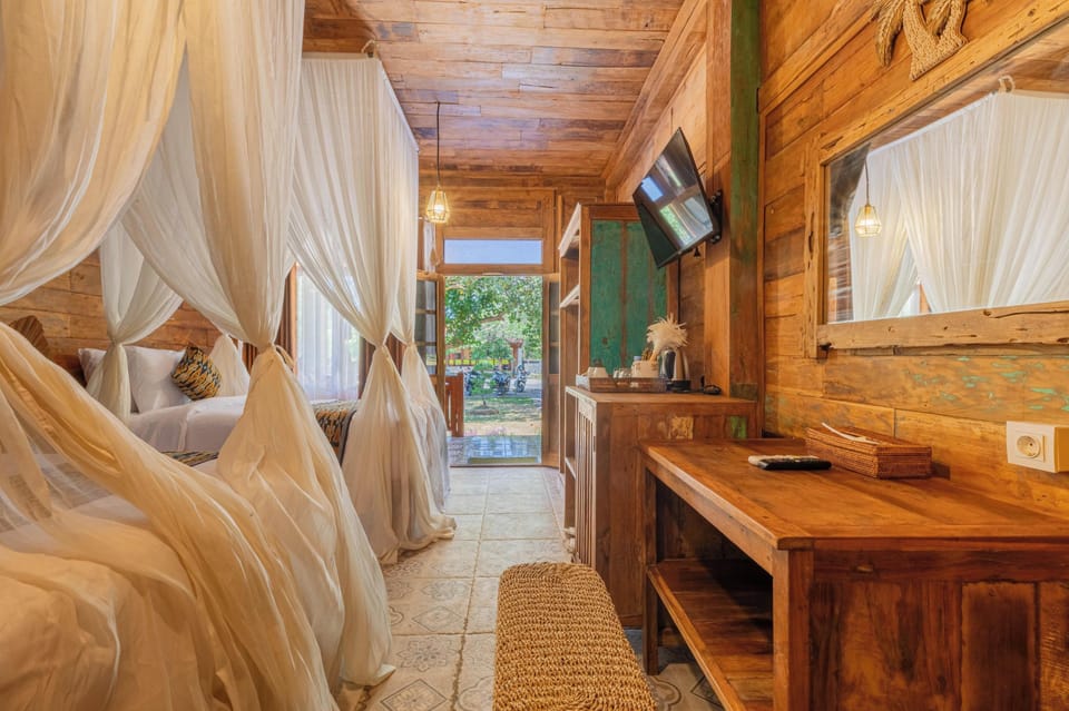 Deluxe Twin Room, Terrace, Garden View | Minibar, in-room safe, desk, soundproofing