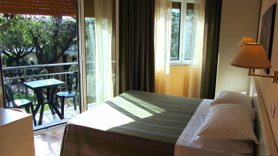 Comfort Double Room, Balcony, Garden View | Minibar, in-room safe, desk, cribs/infant beds