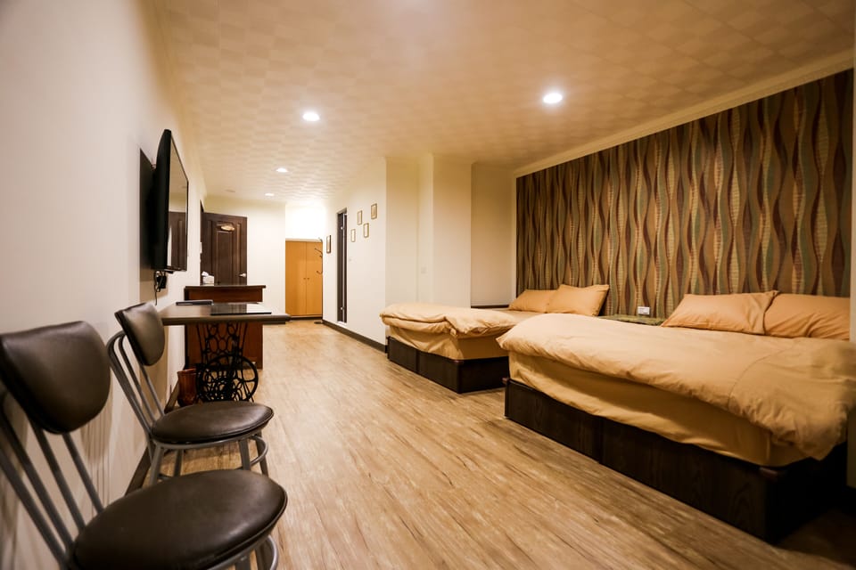 Elite Quadruple Room, 2 Double Beds, Courtyard View | Blackout drapes, soundproofing, free WiFi, bed sheets