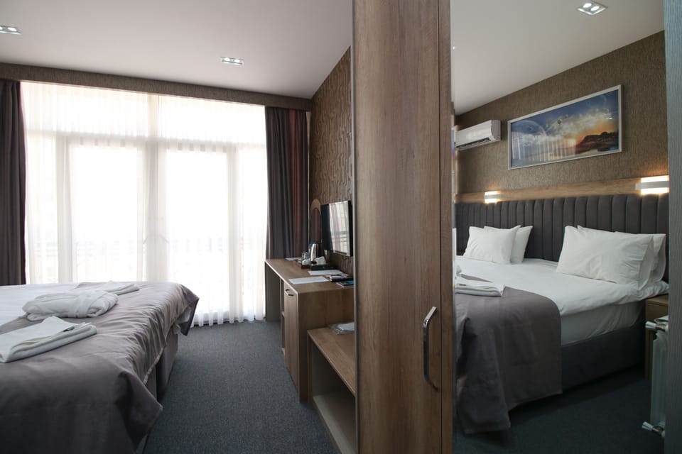 Superior Double Room, 1 King Bed | Minibar, in-room safe, laptop workspace, blackout drapes