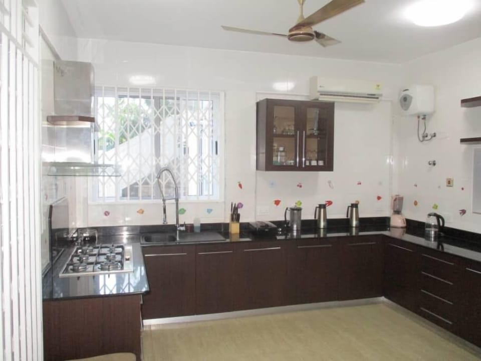 Luxury Apartment | Private kitchen | Full-size fridge, microwave, oven, stovetop