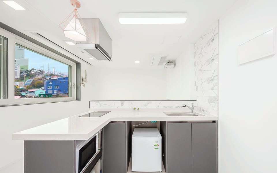 301 - 403 (1 Family sized bed for 3-4 people) | Private kitchenette | Fridge