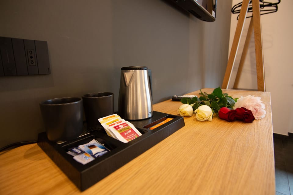 Design Room, 1 Queen Bed, City View (3) | Coffee and/or coffee maker