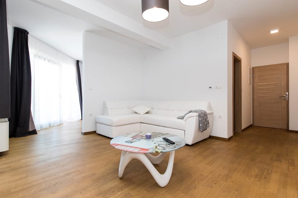 Suite, Sea View | Living area | Flat-screen TV