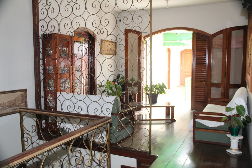 Basic Triple Room | Living area | Flat-screen TV