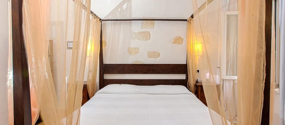 Classic Room, City View | Minibar, blackout drapes, soundproofing, iron/ironing board