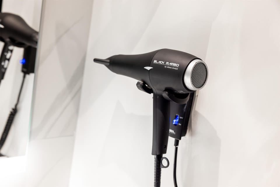 Premium bedding, down comforters, minibar, in-room safe