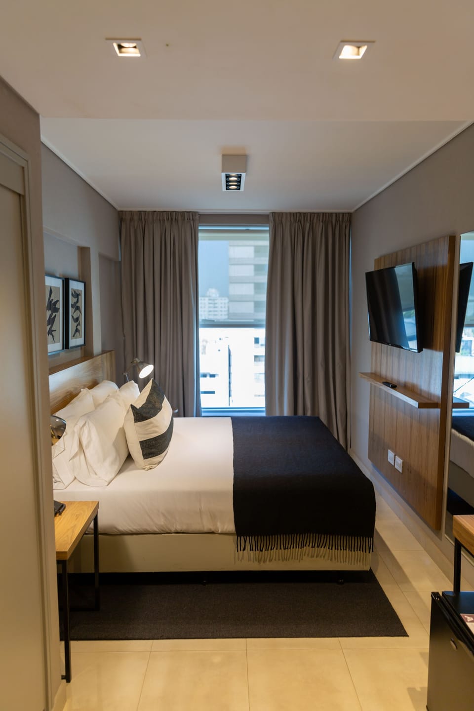Economy Double Room, City View | Minibar, in-room safe, iron/ironing board, free WiFi